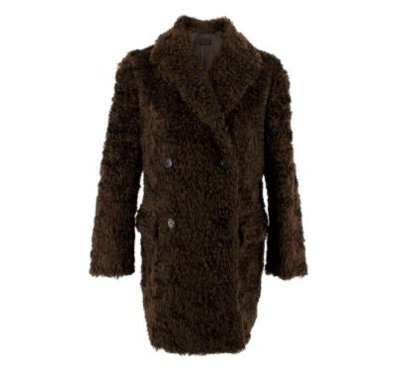 Prada Brown Faux Fur Double Breasted Coat

-Two waist flap pockets 
-Heavy weight construction
-Fully lined 
-Front button fastening 
-Brown faux fur body 
-Interior chest buttoned pocket 

Condition 9.5/10. Fantastic condition

Material: 

26%
