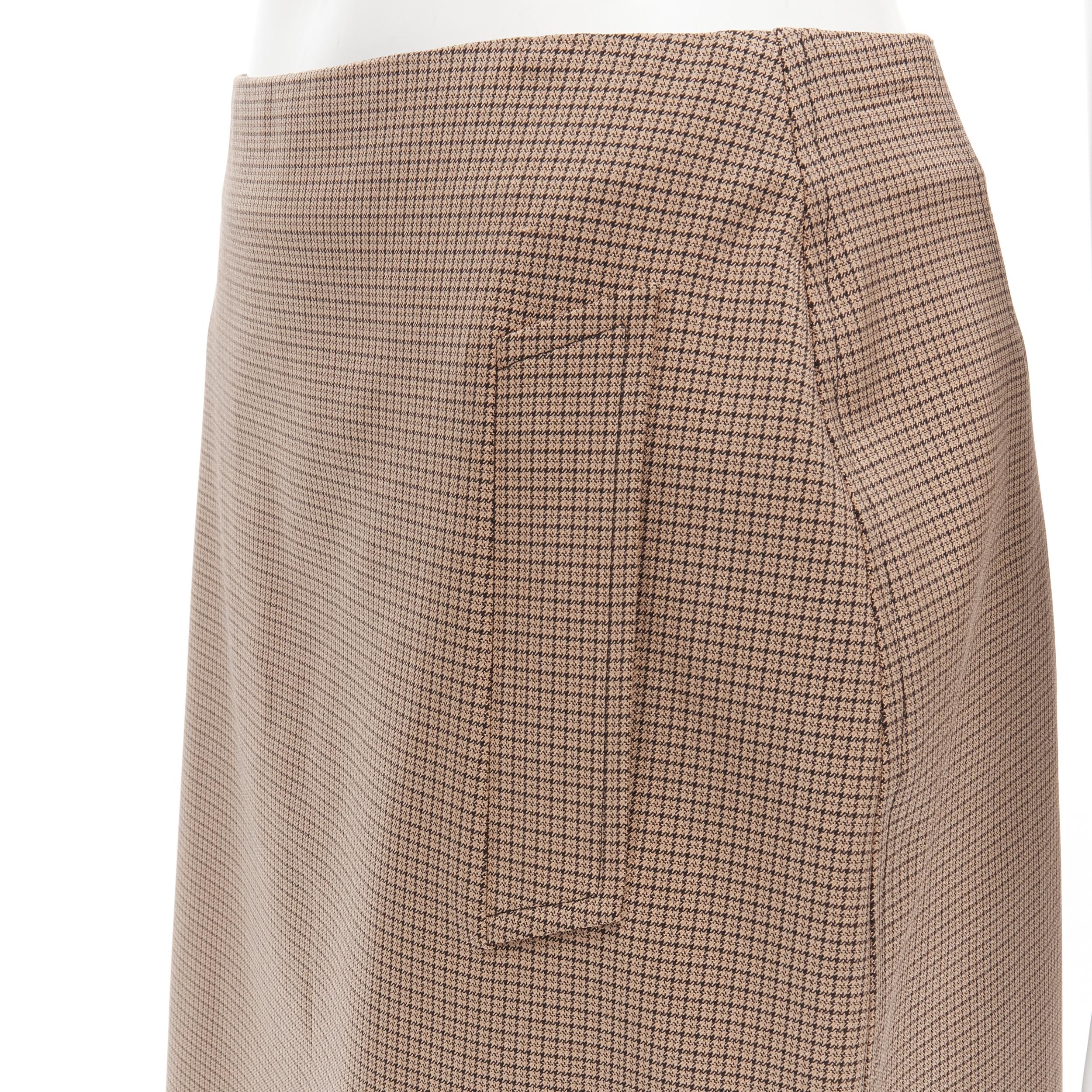 PRADA brown gingham check crepe dual pocket knee length skirt IT42 M 
Reference: JECN/A00012 
Brand: Prada 
Designer: Miuccia Prada 
Color: Brown 
Pattern: Check 
Closure: Zip 
Extra Detail: Dual front pockets. 

CONDITION: 
Condition: Excellent,