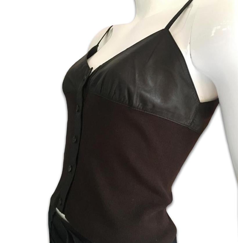 PRADA Brown leather + cotton bustier with buttons

Tag: PRADA

Size S

Measurements
Lenght: 46cm/ 18,11inch
Chest: 39cm/ 15,35inch
Waist: 35cm/ 13,77inch

Material
100% leather
2nd fabric: 100% cotton

Amazing condition, 9,5/ 10
It s a bit too small