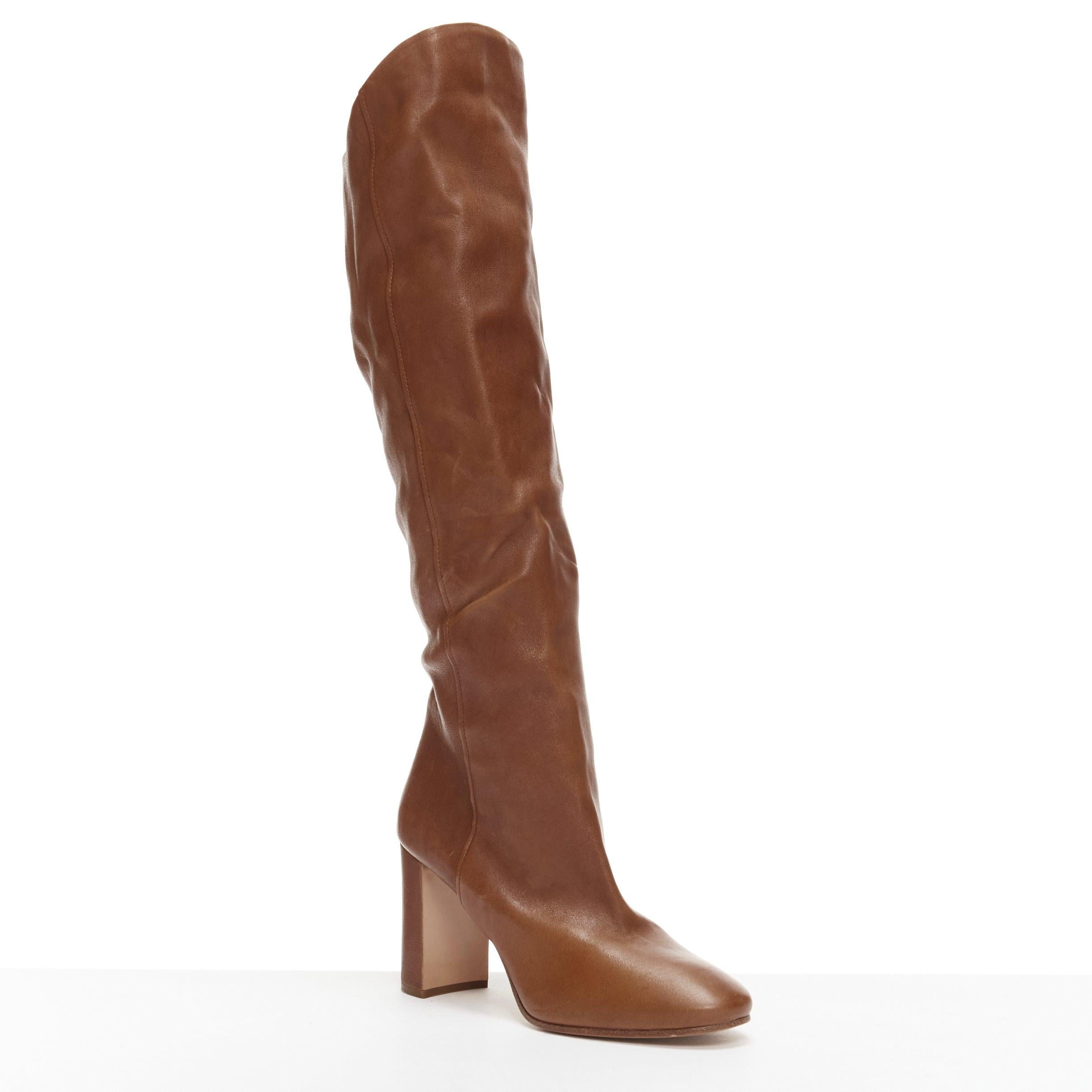 PRADA brown leather high low top almond toe block heel tall boots EU38
Reference: AAWC/A00948
Brand: Prada
Designer: Miuccia Prada
Material: Leather
Color: Brown
Pattern: Solid
Closure: Slip On
Lining: Brown Leather
Made in: