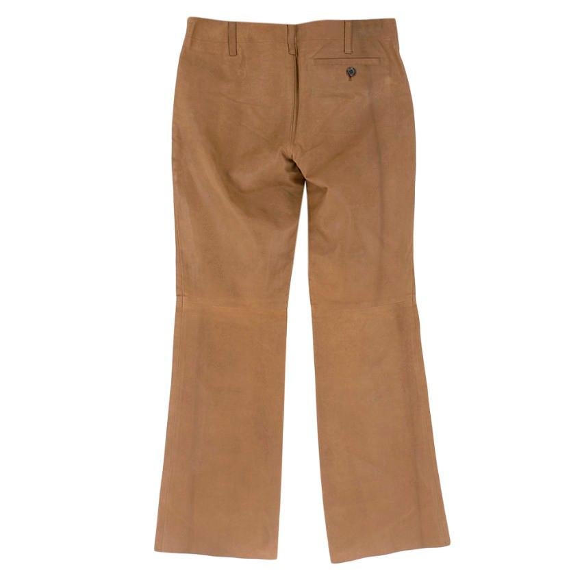 Brown flared leather pants from Prada featuring a low waist and a cropped length. 

- Concealed side zipper
- A back pocket
- Made in Italy

Please note, these items are pre-owned and may show signs of being stored even when unworn and unused. This