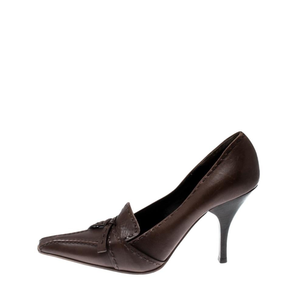 Create a smart professional look by flaunting this pair, designed from leather into a fabulous silhouette featuring to stitch details all over. Your everyday styling can never be complete without this pair of pumps from Prada. Brown is the colour