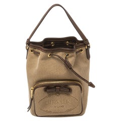Prada Braune Logo-Jacquard-Leinwandtasche mit Lederbesatz