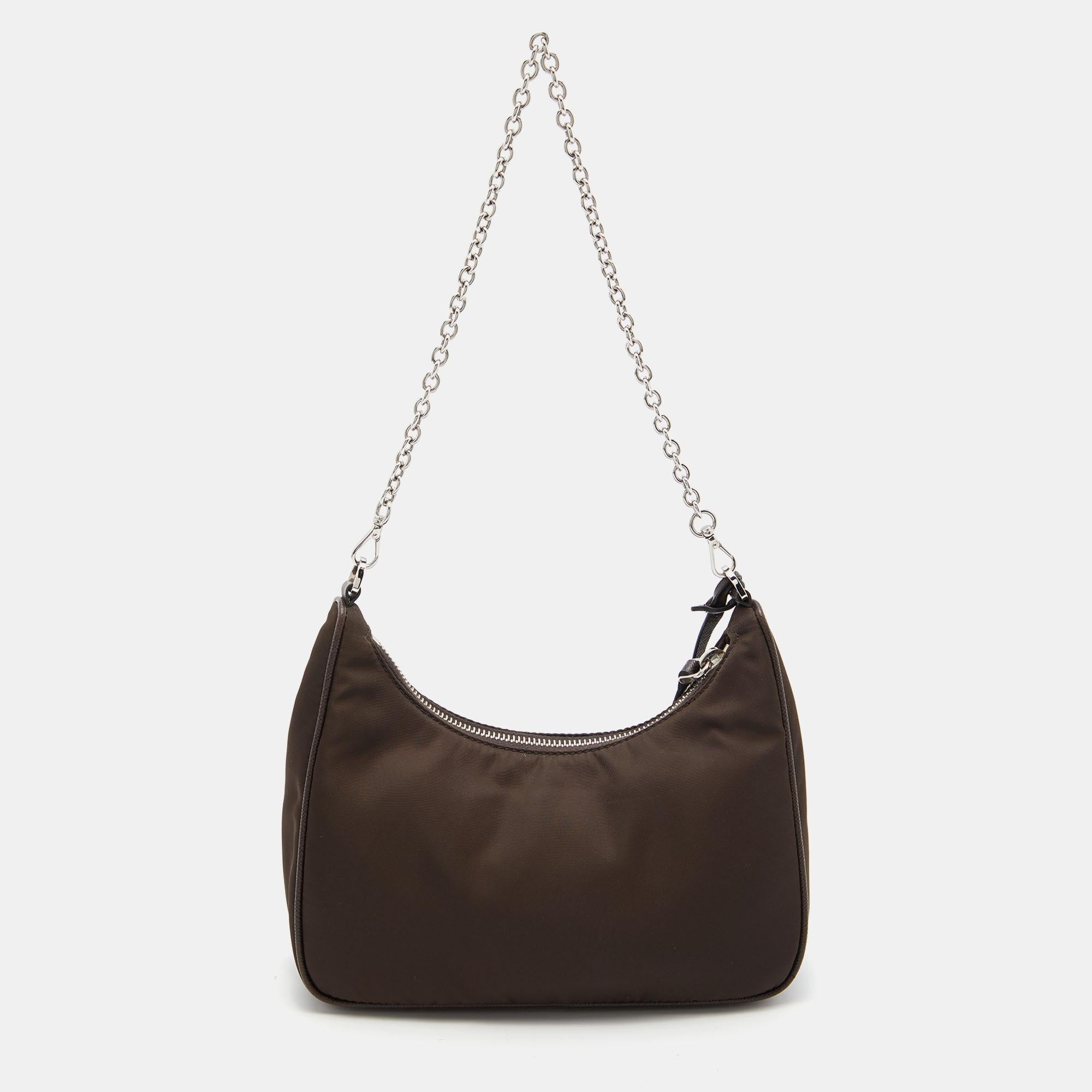 The petite silhouette and classic elements made the Prada Re-Edition 2005 bag an instant hit among fashionistas. Inspired by the classic mini hobo bag, this creation comes made from fine materials and features a shoulder strap.

Includes: Detachable