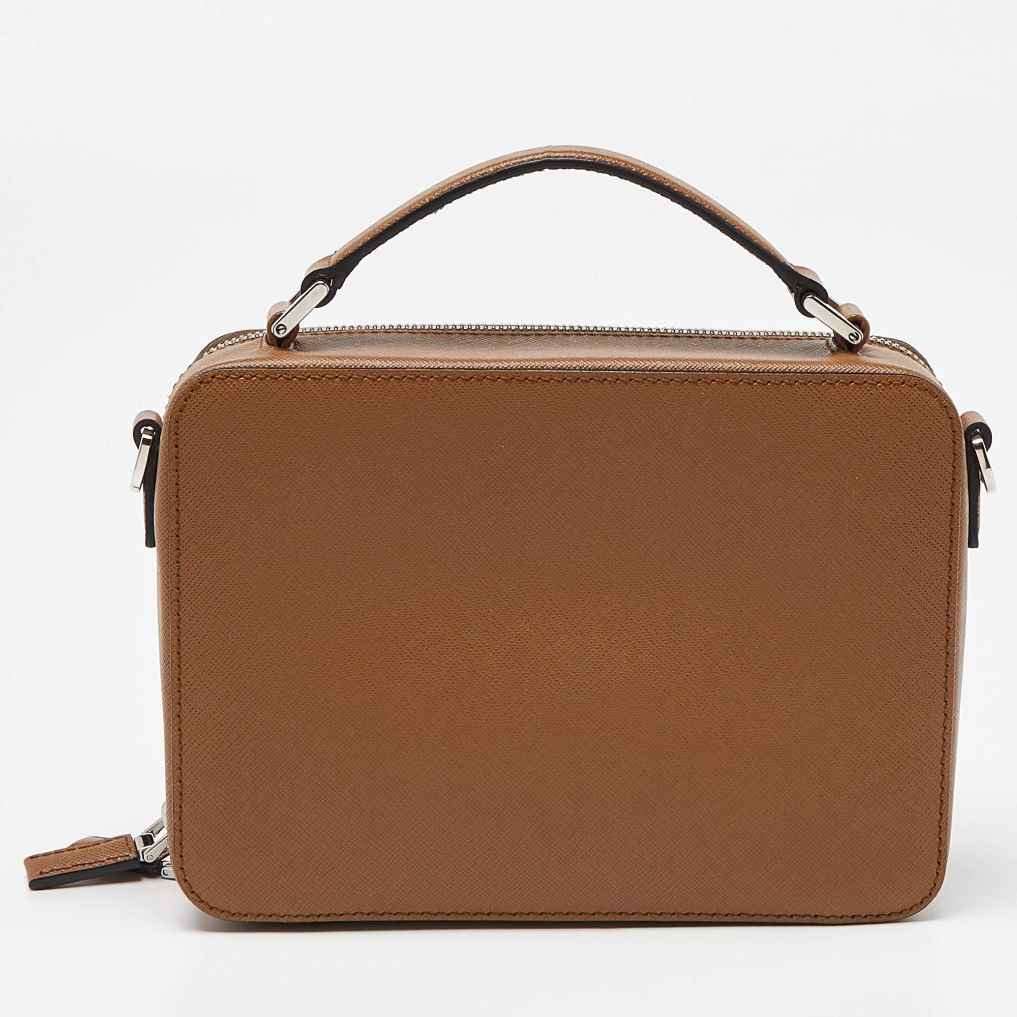 Trust Prada messenger bags to offer functional ease and a comfortable carrying experience. Smartly designed, the bag has an appealing exterior and a spacious interior. Perfect for work and weekend getaways.

Includes: Authenticity Card, Detachable