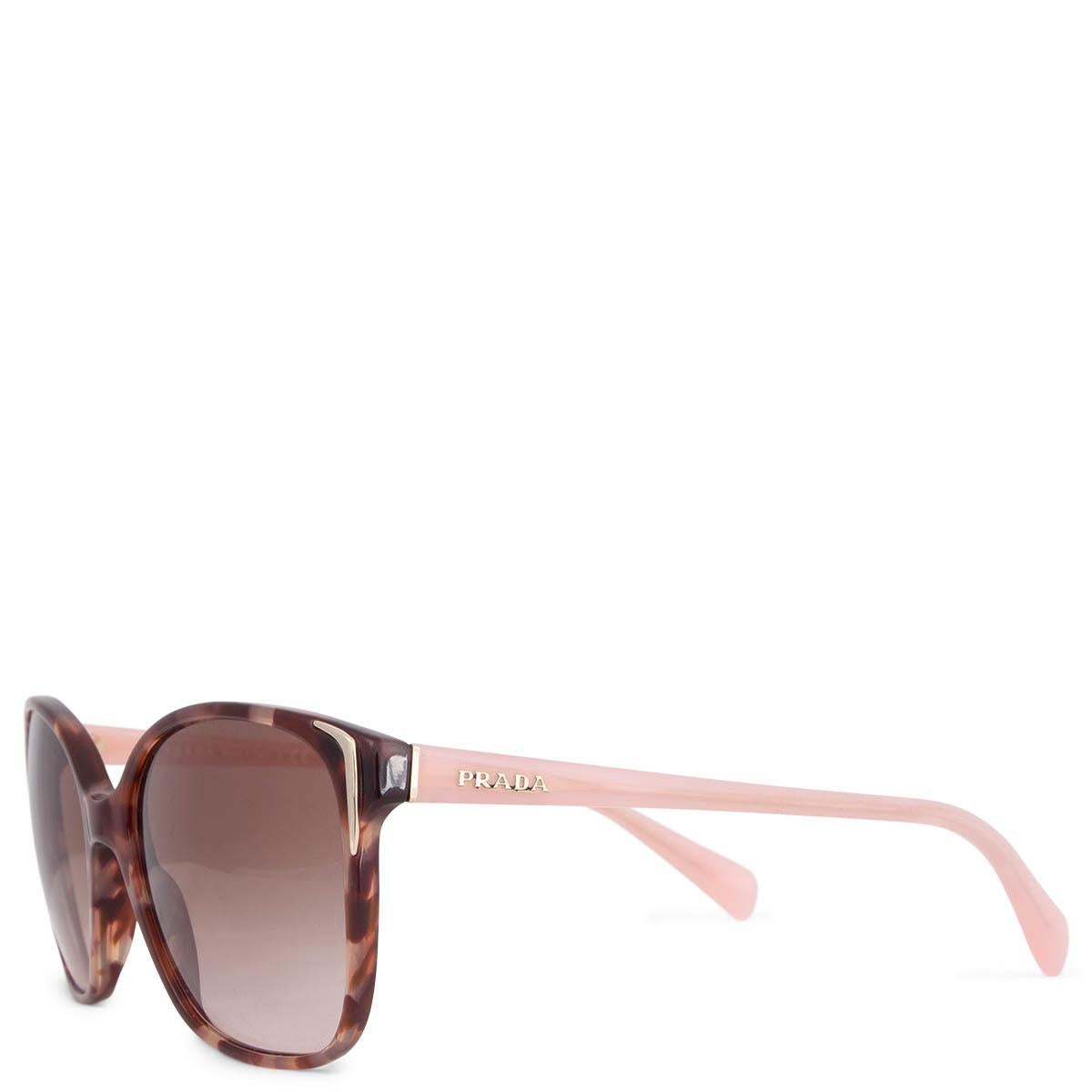 100% authentic Prada SPR 010 oval sunglasses in brown and light rose tortoiseshell acetate with light rose temples and brown gradient lenses. Have been worn and are in excellent condition. Come with case. 

Measurements
Model	SPR 010
Width	14cm