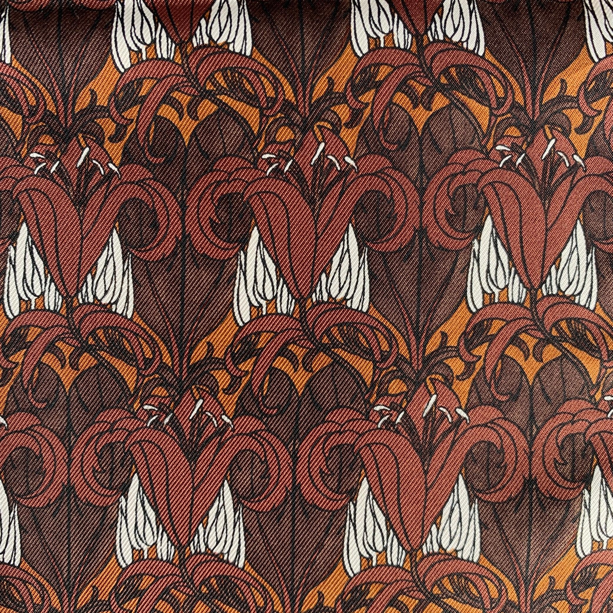 PRADA pocket square
in a brown and white fabric featuring an abstract floral pattern.Very Good Pre-Owned Condition. Brand tag removed by previous owner. 

Measurements: 
  11.25 inches  x 11 inches 
  
  
 
Sui Generis Reference: 136439
Category: