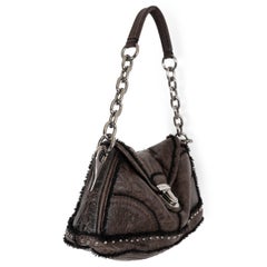 PRADA Bruciato sac 2010 en cuir marron clouté doublé mouton