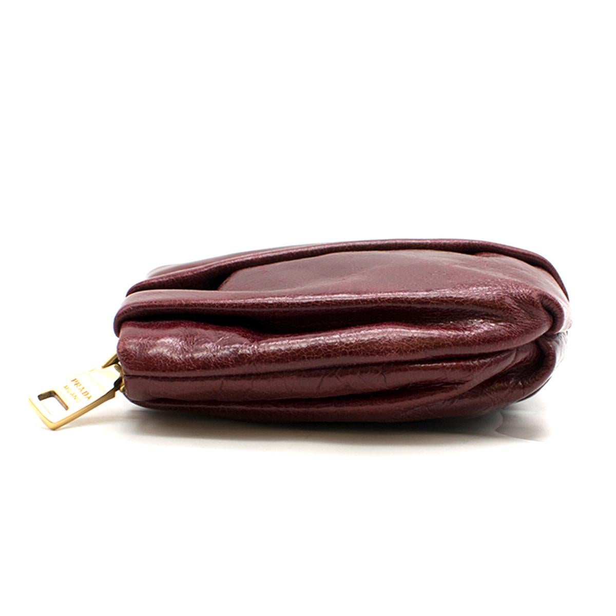 Prada burgundy leather wristlet clutch In Excellent Condition In London, GB