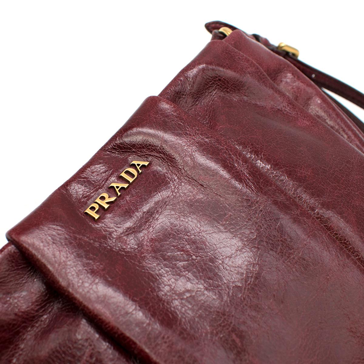 Women's Prada burgundy leather wristlet clutch