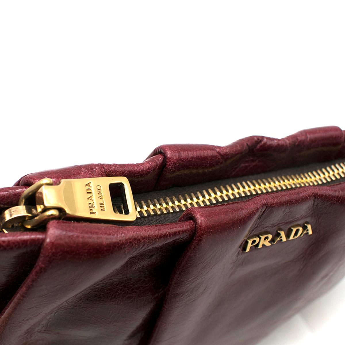 Prada burgundy leather wristlet clutch 1