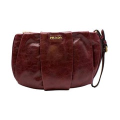 Prada burgundy leather wristlet clutch