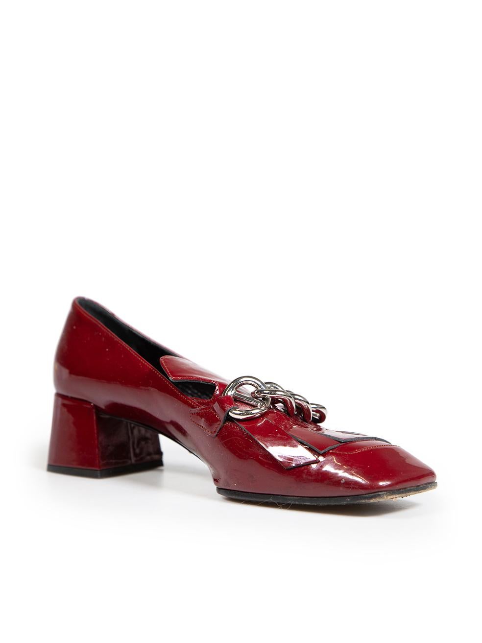 CONDITION is Very good. Minimal wear to the shoes is evident. There are light abrasions on the front tip and heels of both shoes on this used Prada designer resale item.
 
 
 
 Details
 
 
 Burgundy
 
 Patent leather
 
 Loafers
 
 Mid block heel
 
