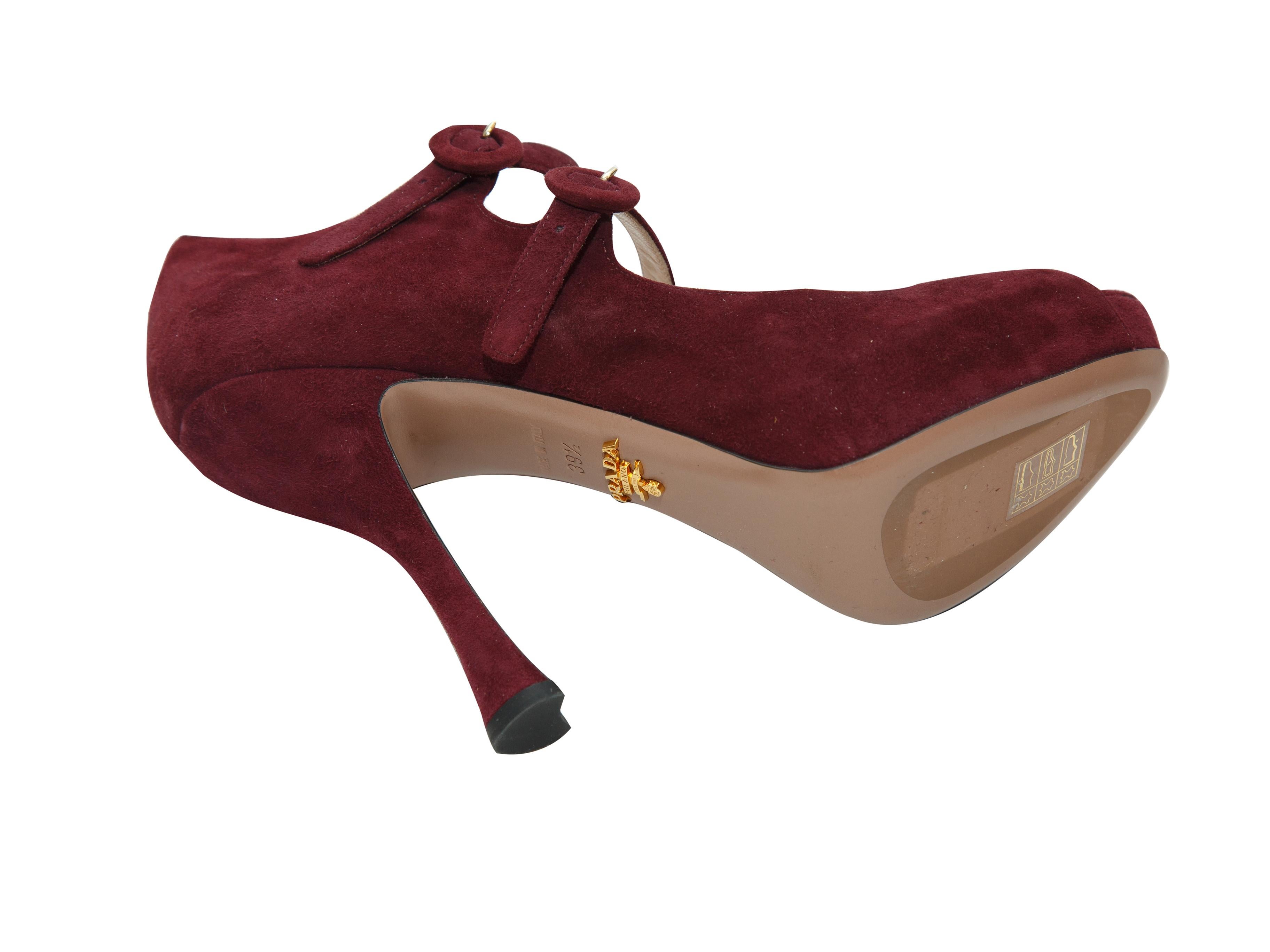 Product details: Burgundy suede peep-toe Mary Jane heels by Prada. Covered heels. Double buckle closures. Designer size 39.5. 4.75