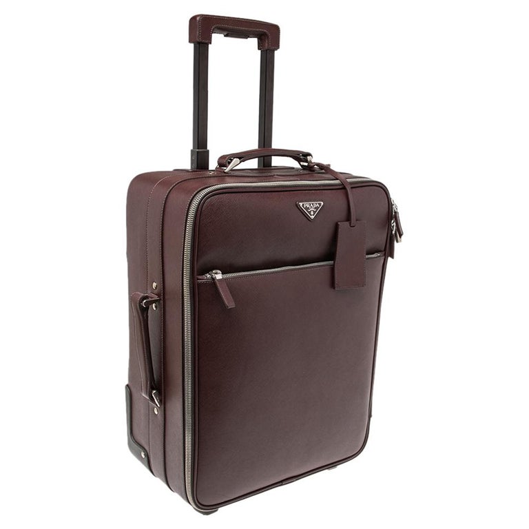 Prada Burgundy Saffiano Leather Travel Trolley Rolling Luggage at 1stDibs |  prada rolling luggage, prada saffiano leather trolley, prada luggage