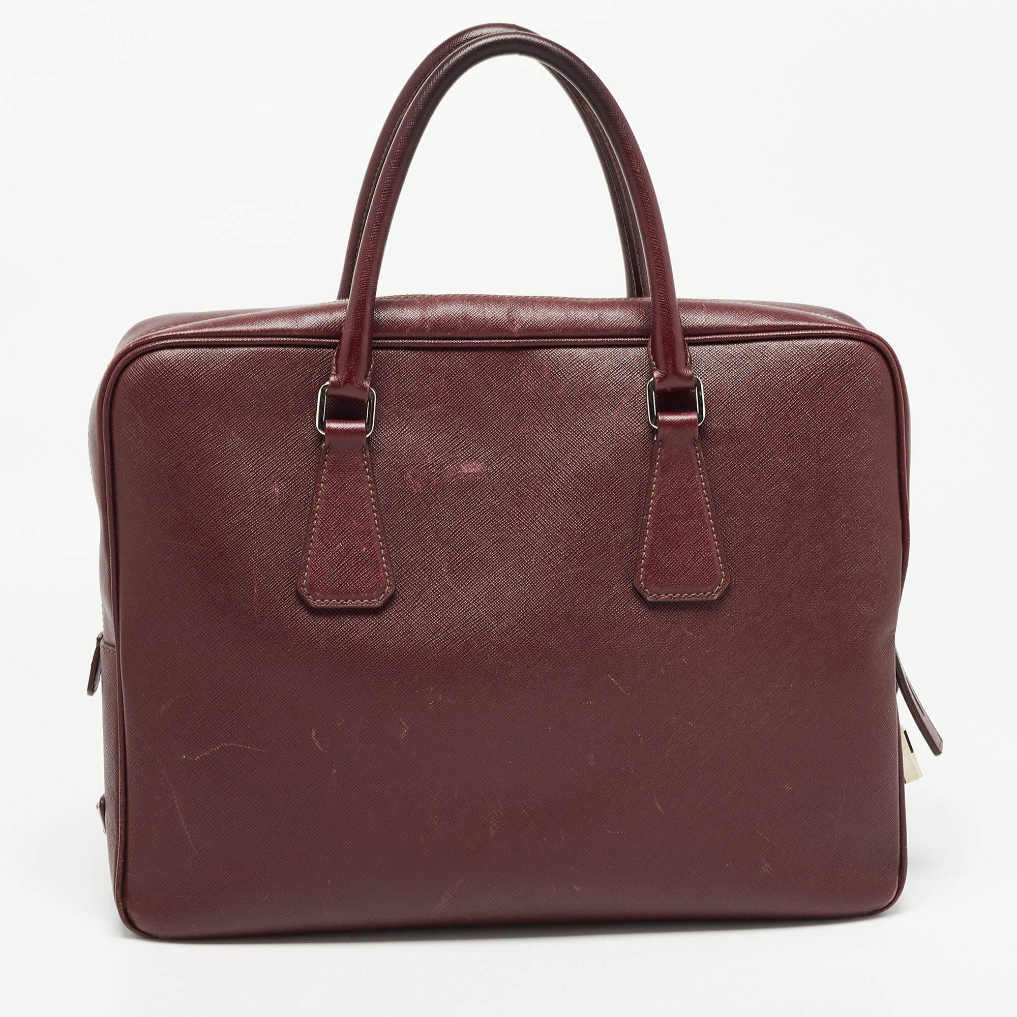 Perfect for conveniently housing your essentials in one place, this Prada briefcase is a worthy investment. It has notable details and offers a look of luxury.

Includes: Padlock