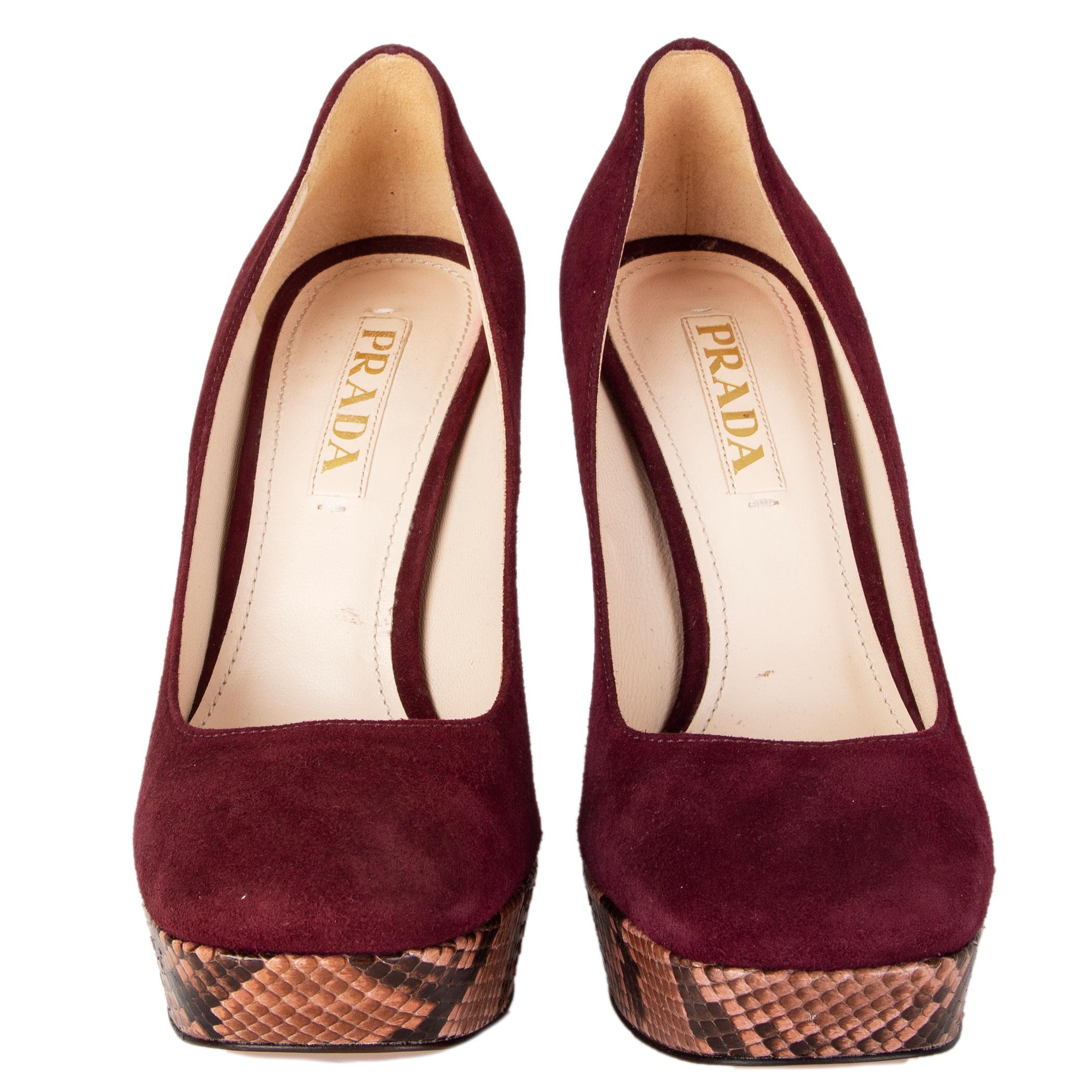 100% authentic Prada platform pumps in burgundy suede featuring rose and brown python heel and platform sole. Have been worn once and are in virtually new condition. 

Measurements
Imprinted Size	36
Shoe Size	36
Inside Sole	23.5cm (9.2in)
Width	7cm