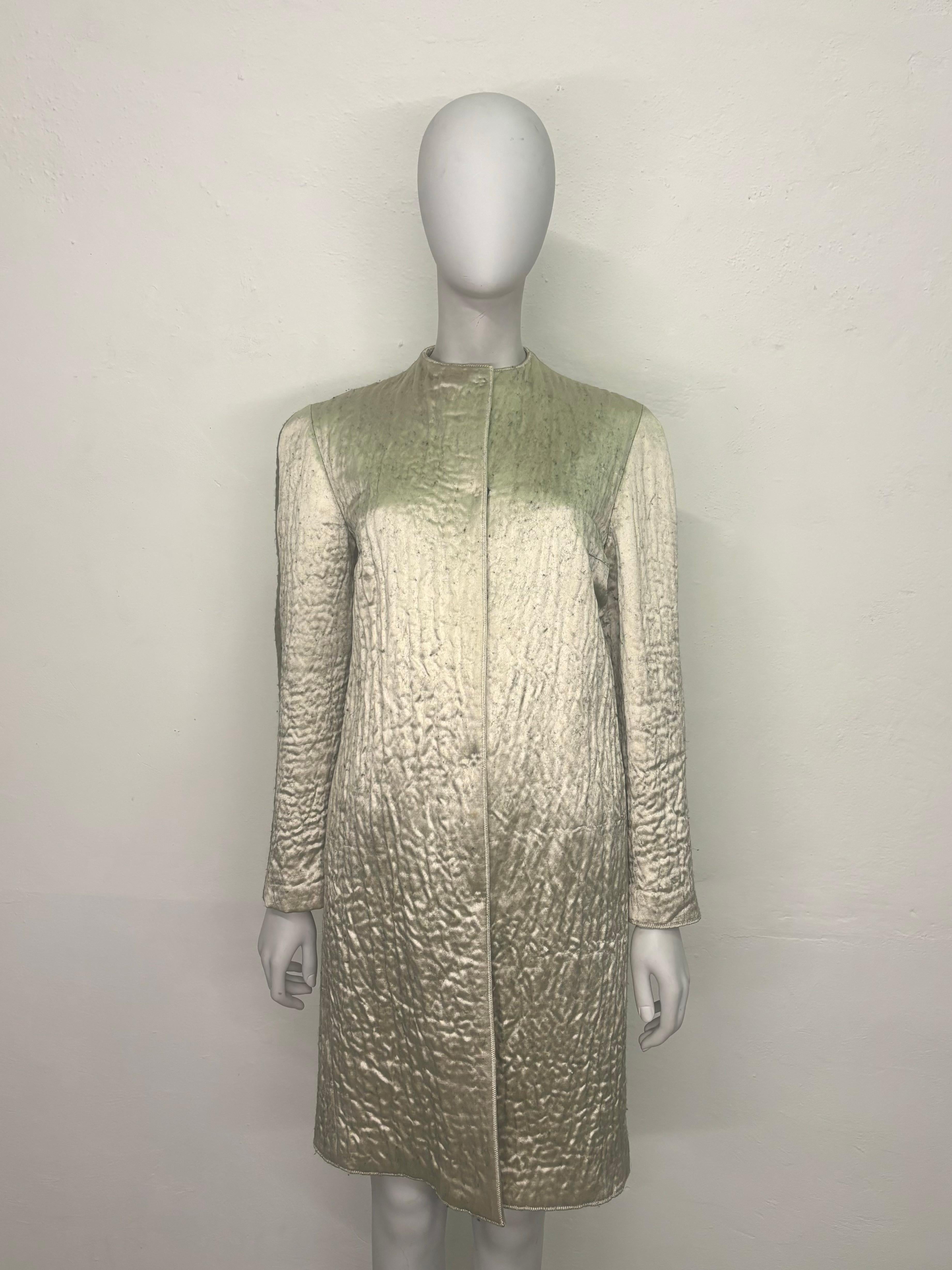 - Prada by Miuccia Prada
- Fall Winter 1998 collection
- Sold by Gold Palms Vintage
- Textured silk coat
- Champagne and green colorway
- Round collar
- Above knee length
- Size IT 38