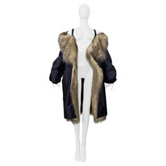 Prada By Raf Simons Manteau bombardier bleu avec fausse fourrure et capuche 2021