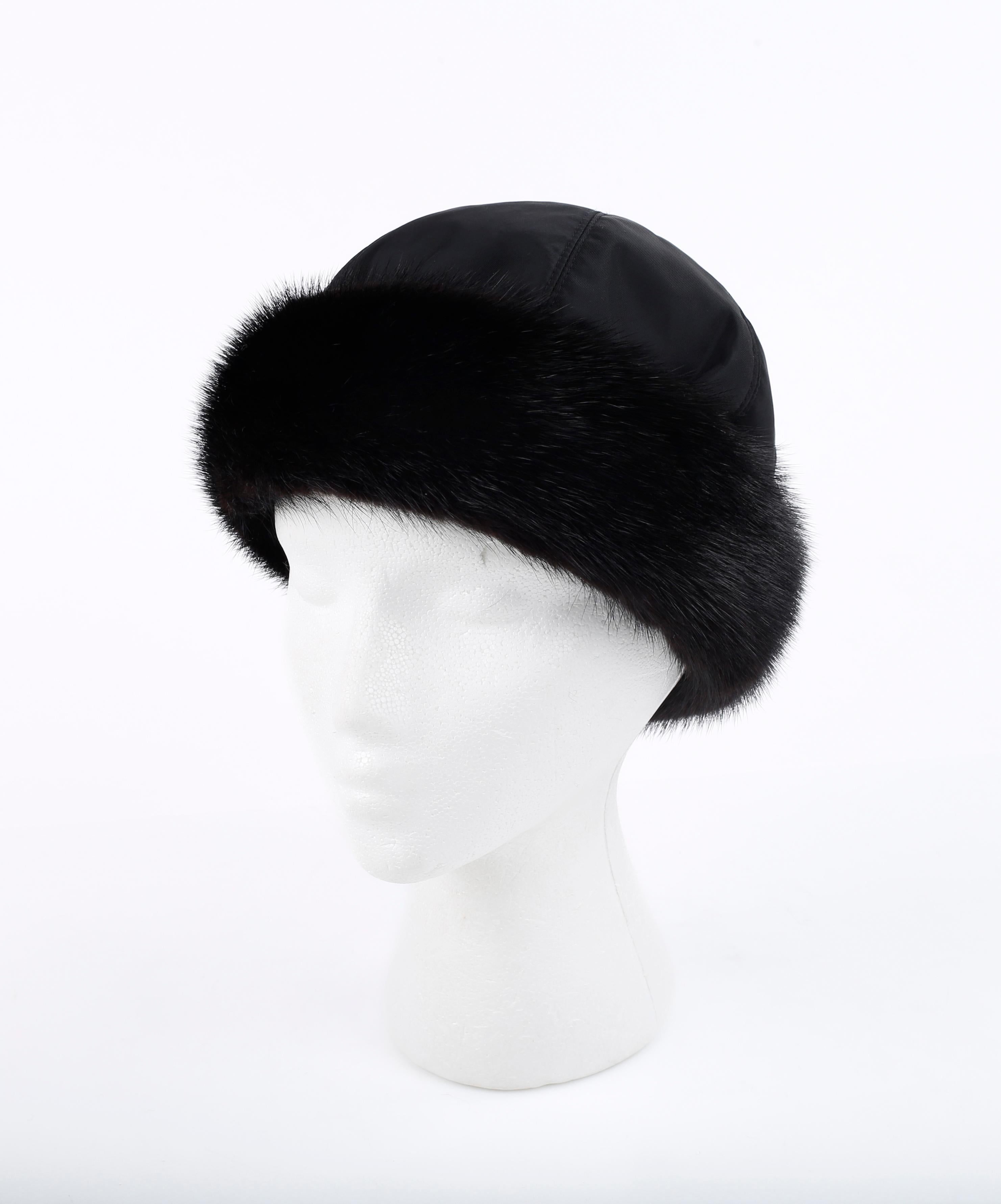 PRADA c. 1990's Black Mink Fur Nylon Winter Hat Cap

Brand / Manufacturer: Prada
Circa: 1990's
Designer: Miuccia Prada
Style: Winter Cap
Color(s): Black
Lined: Yes
Marked Fabric: 