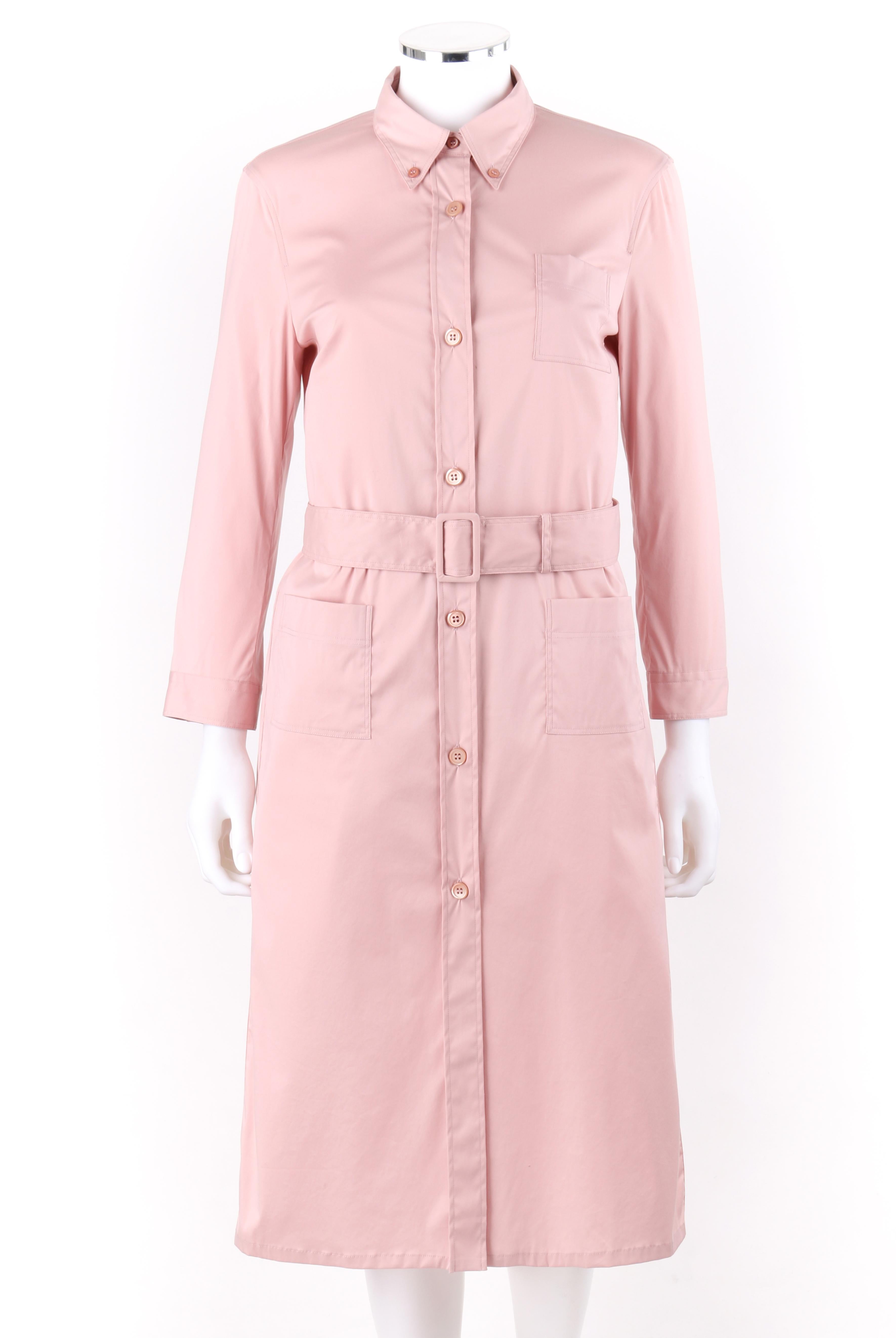 PRADA c.2000’s Pink Button Down Patch Pocket Belted Long Sleeve Shirt Dress

Brand / Manufacturer: Prada
Circa: 2000’s
Designer: Miuccia Prada 
Style: Shirtdress
Color(s): Pink
Lined: No
Marked Fabric Content: “72% Cotton, 23% polyamide, 5%