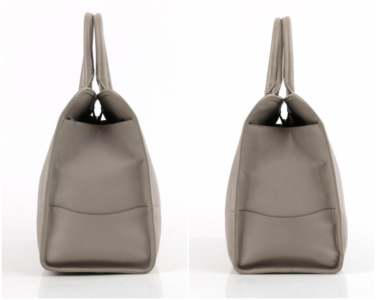 PRADA c.2011 “Saffiano Lux” Pomice Grey Leather Tote + Strap Large Handbag In Good Condition For Sale In Thiensville, WI