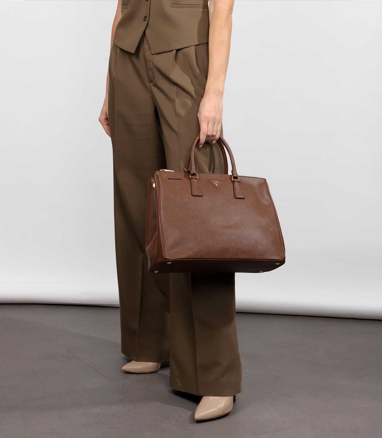 Prada Cacao Saffiano Lux Leather Large Galleria Tote

Product Details
Xupes Ref: CB1303
Brand: Prada
Model: Large Galleria Tote
Type: Tote
Serial Number: 8
Age: 2011
RRP: £3,700
Accompanied By: Prada Dust Bag, Authenticity Card, Care Booklet,
