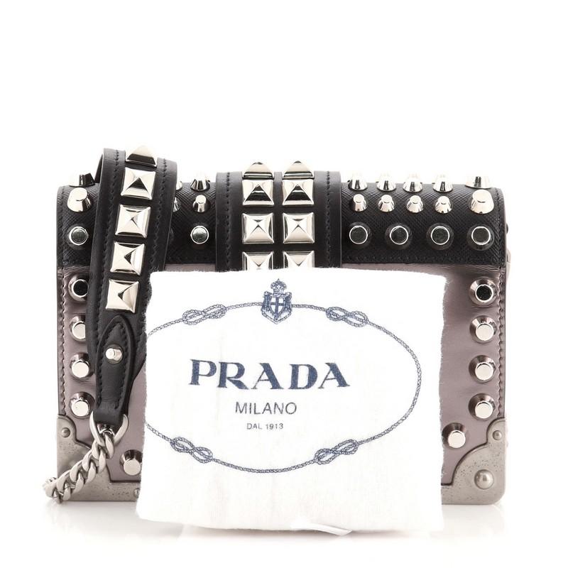 Condition: Good. Creasing, wear, scuffs and small indentations on exterior, underneath flap and in interior, slight splitting on opening flap corner wax edge, scratches and heavy tarnish on hardware.
Accessories: Dust Bag, With Strap
Measurements: