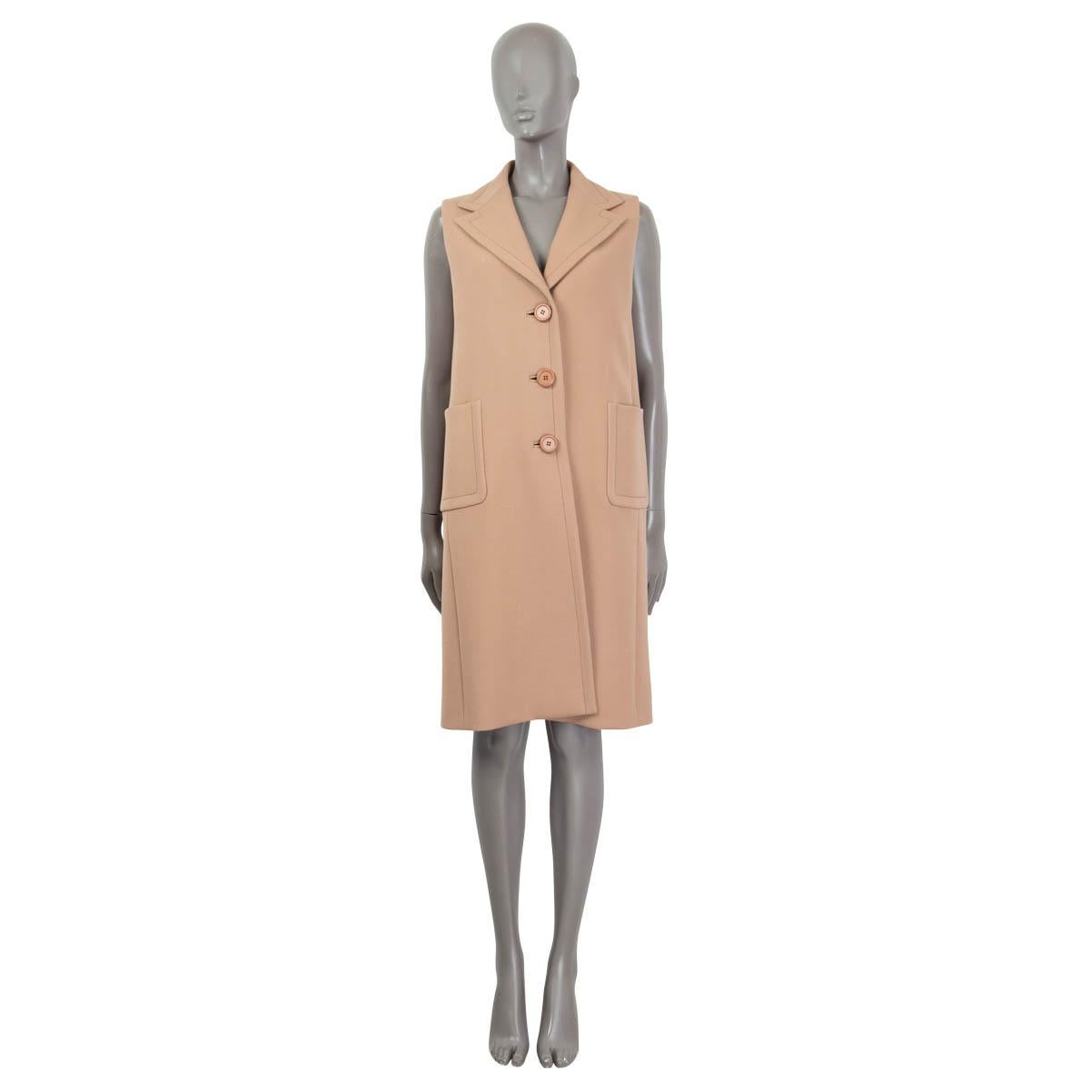 100% authentic Prada sleeveless coat in camel brown wool (100%). Featuring two patch pockets on the front and a notched collar. Closes with buttons on the front. Has been worn and is in excellent condition.

Measurements
Tag Size	44
Size	L
Shoulder