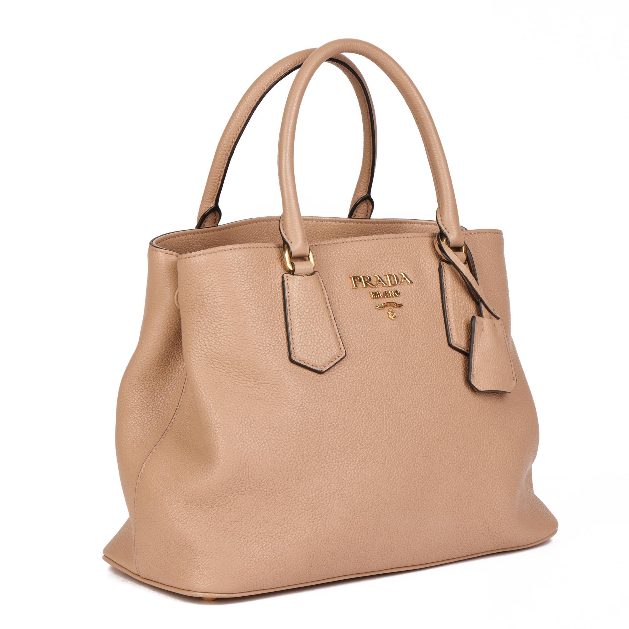 PRADA
Cameo Beige Calfskin Leather Tote Bag

Xupes Reference: HB4268
Serial Number: 203
Age (Circa): 2019
Accompanied By: Prada Dust Bag, Authenticity Card, Prada Invoice, Clochette, Shoulder Strap
Authenticity Details: Authenticity Card, Serial