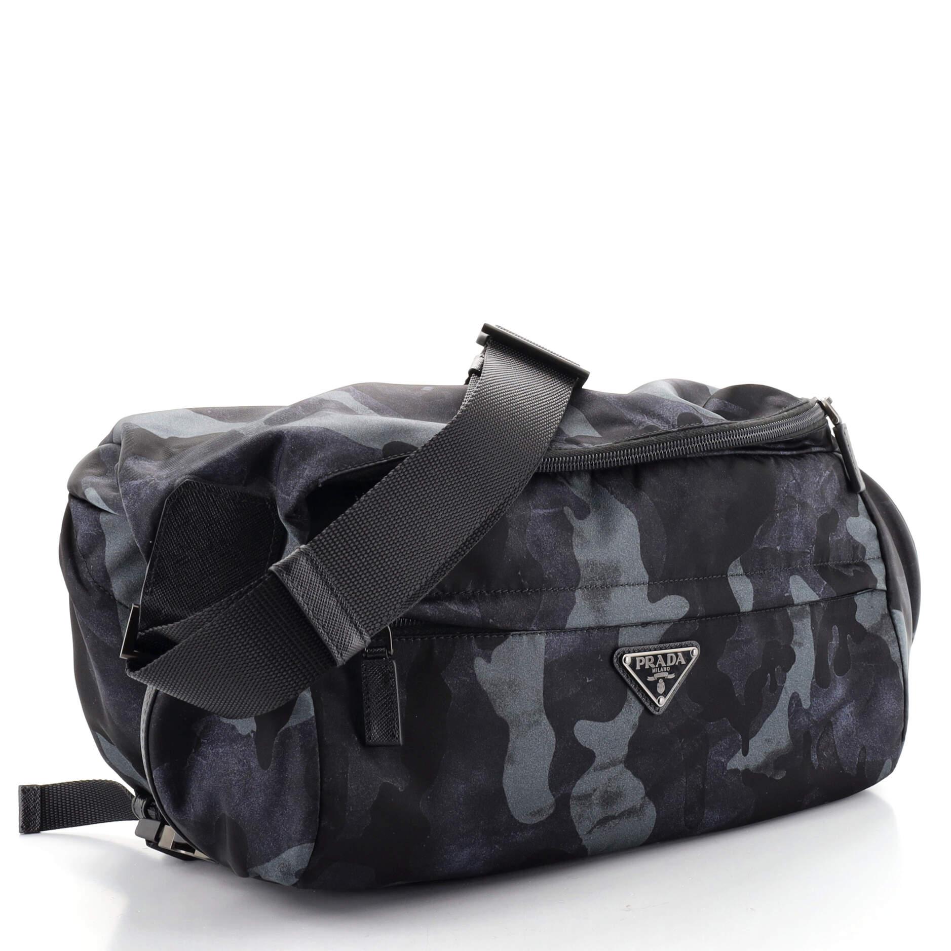 Condition: Excellent. Light creasing on exterior, scratches on hardware.
Accessories: No Accessories
Measurements:
Designer: Prada
Model: Camouflage Convertible Pocket Belt Bag Tessuto Medium
Exterior Material: Nylon
Exterior Color: Print
Interior