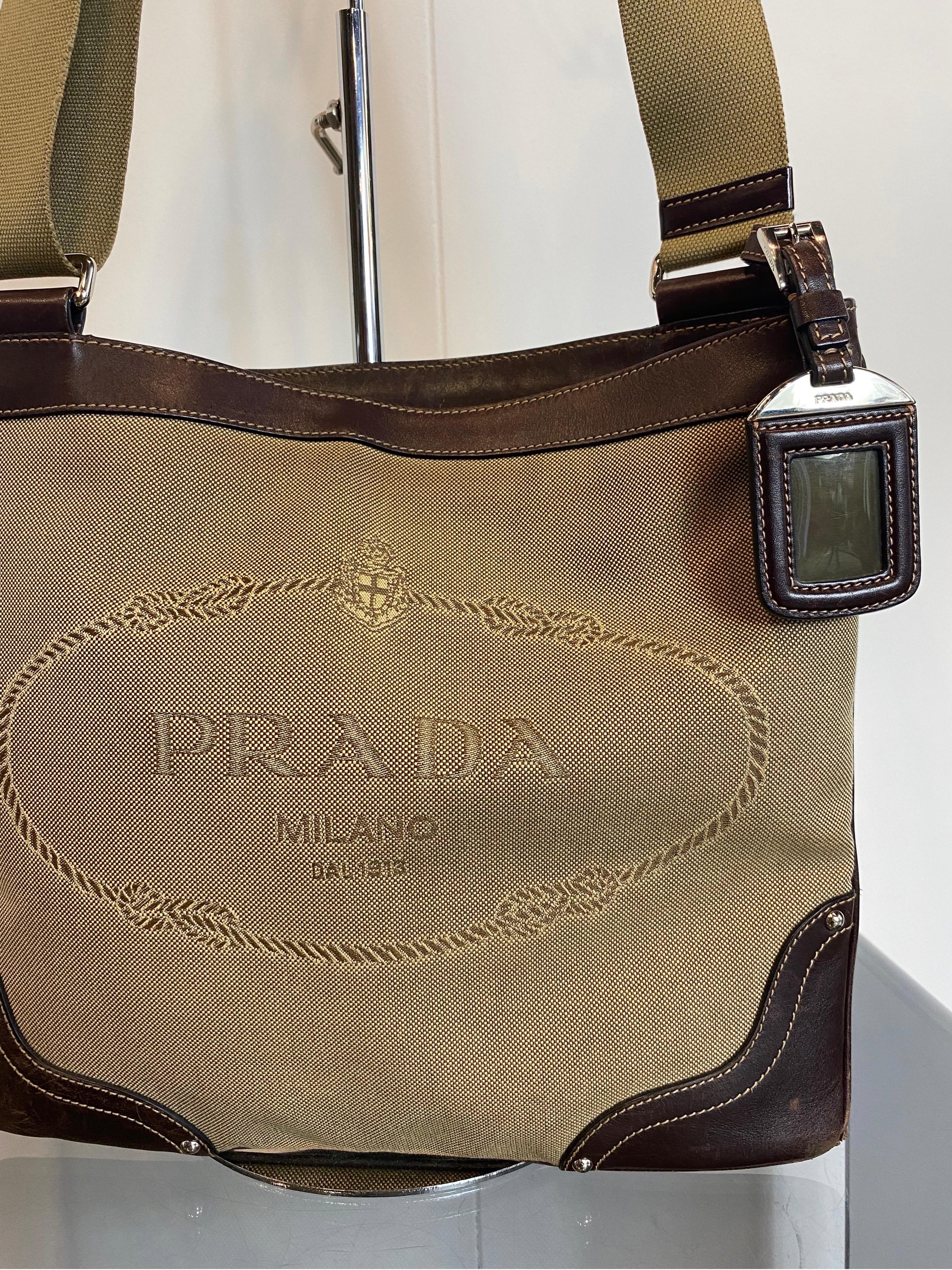 Beige Postina Prada bag.
Prada Canapa shoulder bag in canvas with logo 
In canvas and leather. Interior with all-over logo.
With main pocket closed with zip. Inside another pocket also with zip.
Width 30
Height 27
Depth 2 
In addition to being in