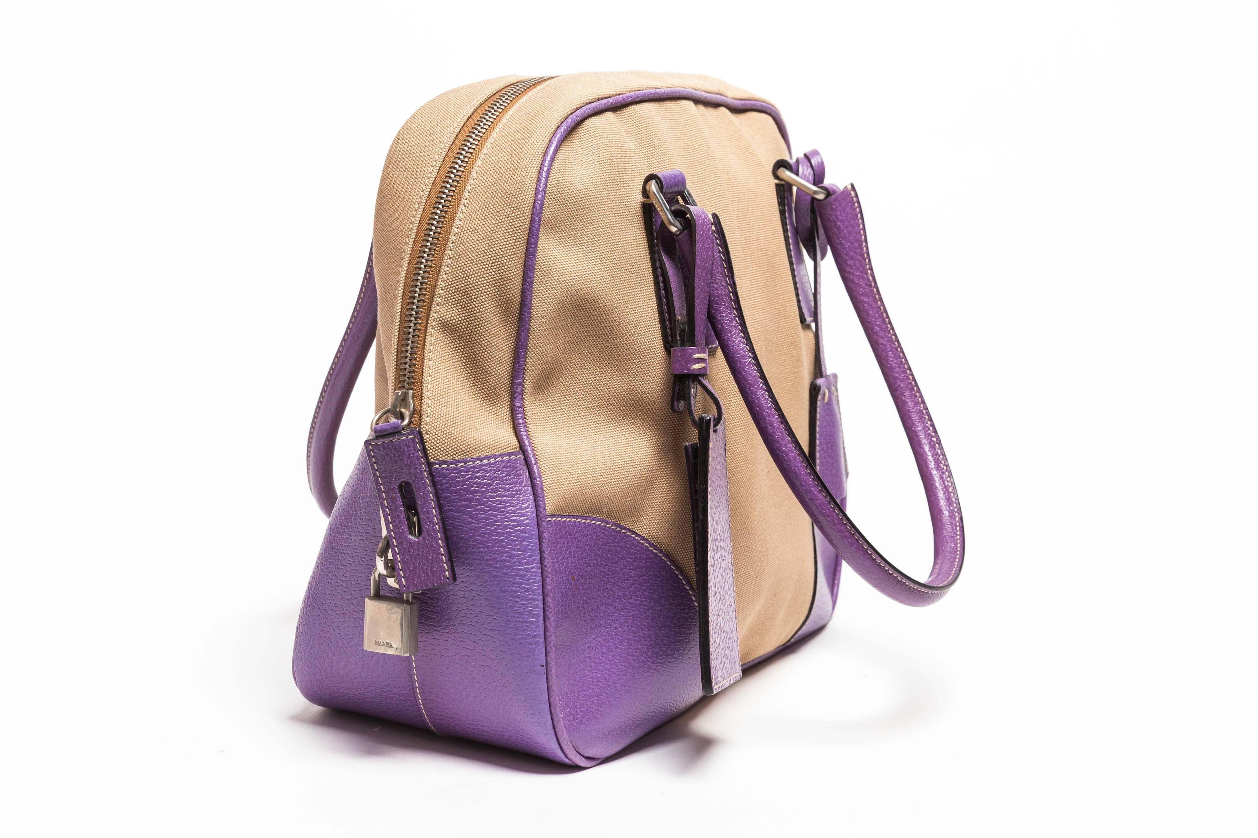 Prada Canvas and Purple Leather Top Handle Bag with Lock,  Keys and Luggage Tag In Good Condition For Sale In Westhampton Beach, NY