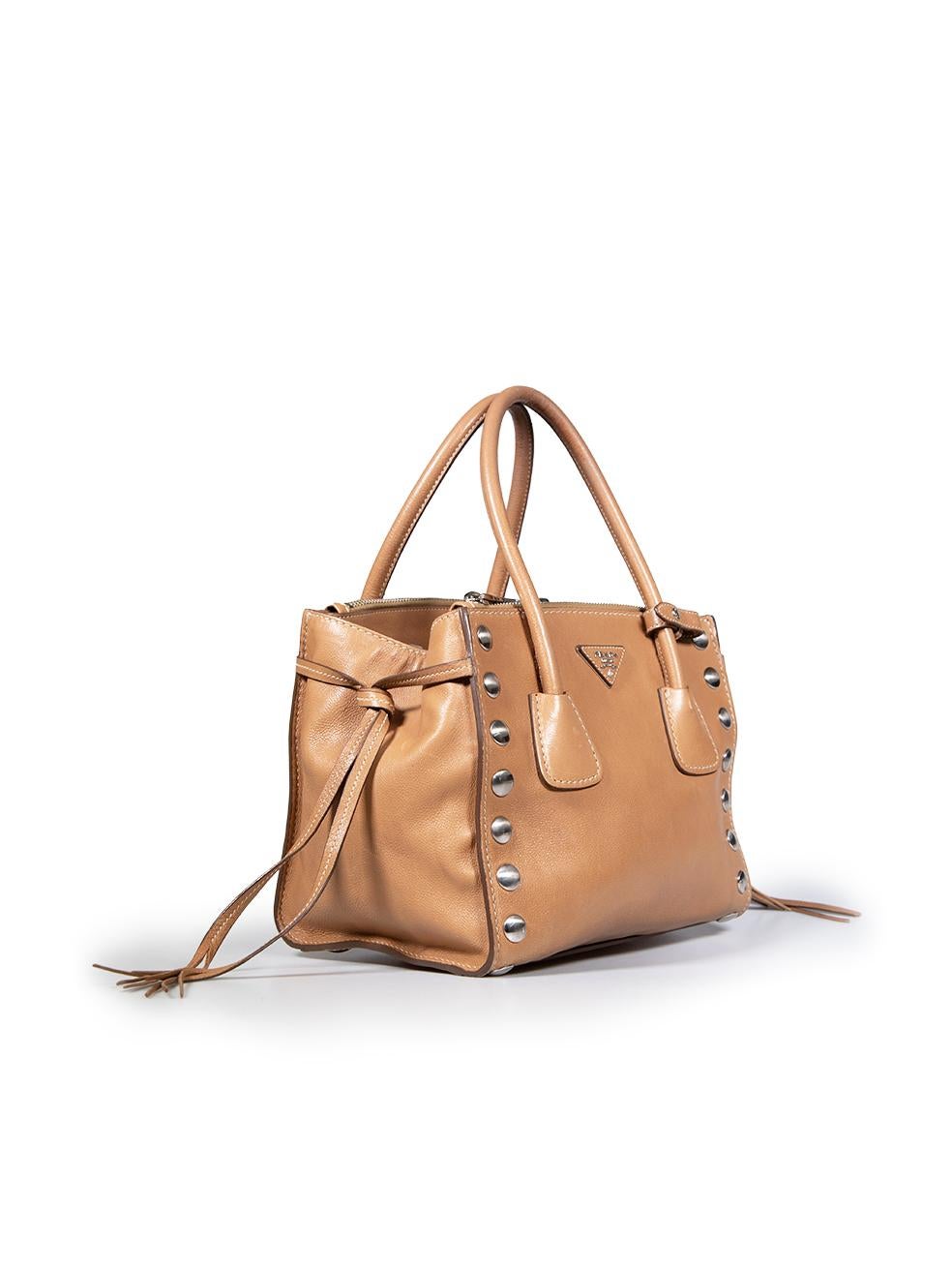 CONDITION is Very good. Minimal wear to the bag is evident. Minimal wear to the top and bottom edges, top handle, handle holder, bottom studs and internal lining is seen with abrasion marks on this used Prada designer resale item.
 
 
 
 Details
 

