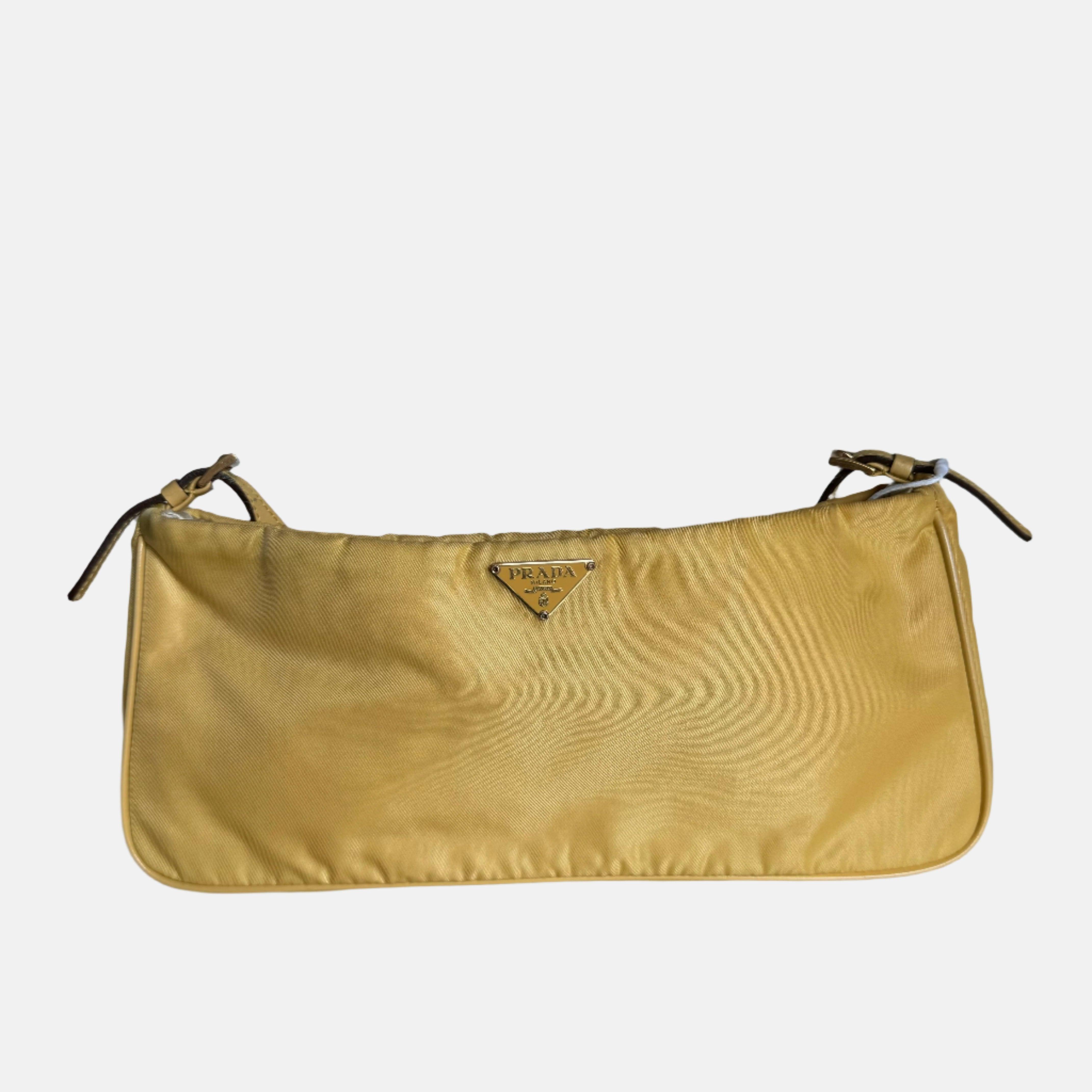 Prada Chain Shoulder Bag Nylon Yellow with Gold-tone Chain
These are professional photos of the actual bag.
  CONDITION: Very good
  Light signs of use throughout. Light scratches to the hardware. 
  DETAILS
  
  PRADA
  Shoulder Bag
  Material:
