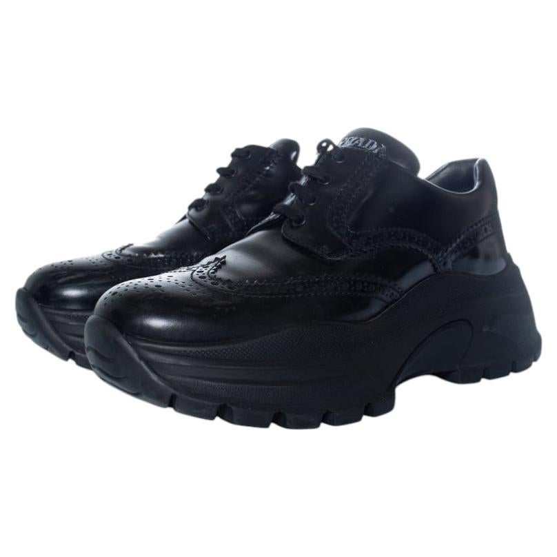 Prada, chunky broque trainers in black For Sale
