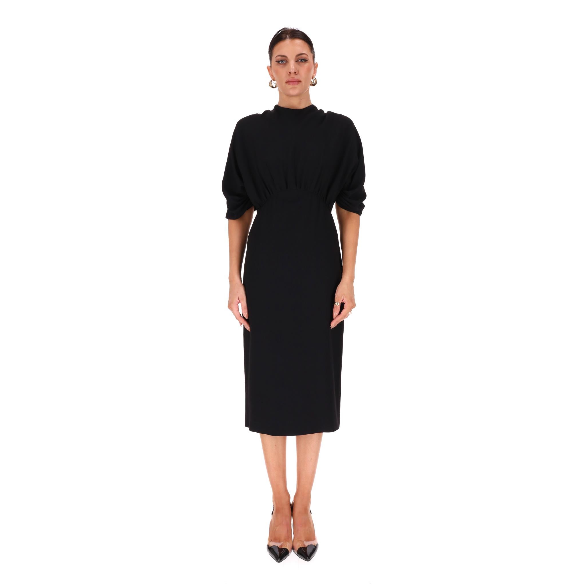 Prada Cinched-Waist Sheath Dress

Black midi sheath dress designed with a cinched waist that falls to a pencil skirt.

Featuring flouncy top with gathered sleeves and zip fastening to rear.

Rrp Approx. £1,600

Size – 40IT

Condition – Very