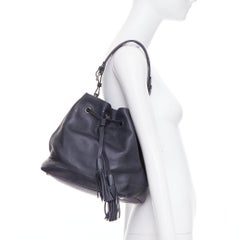 PRADA City Calf Bucket black calfskin leather triangle tassel drawstring bag