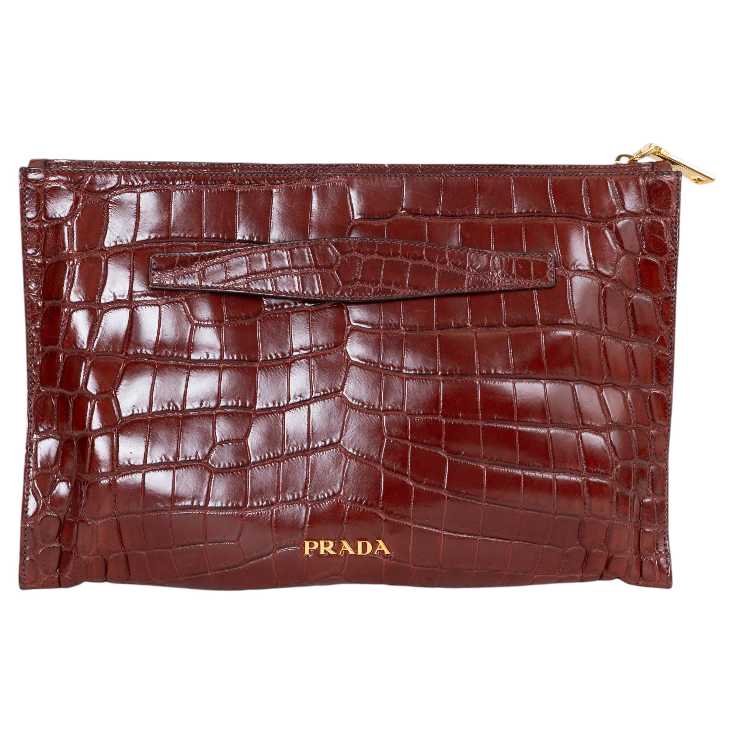 Pochette Prada color cognac in coccodrillo opaco
