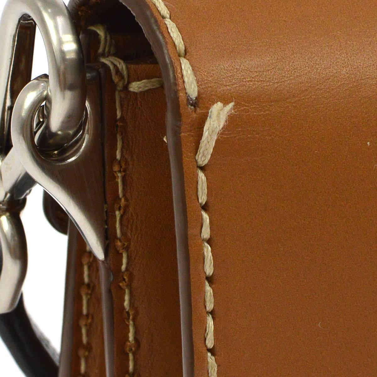 Prada Cognac Leather Colorblock Top Handle Satchel Flap Bag 

Leather
Silver tone hardware
Push lock closure
Made in Italy
Strap handle drop 6