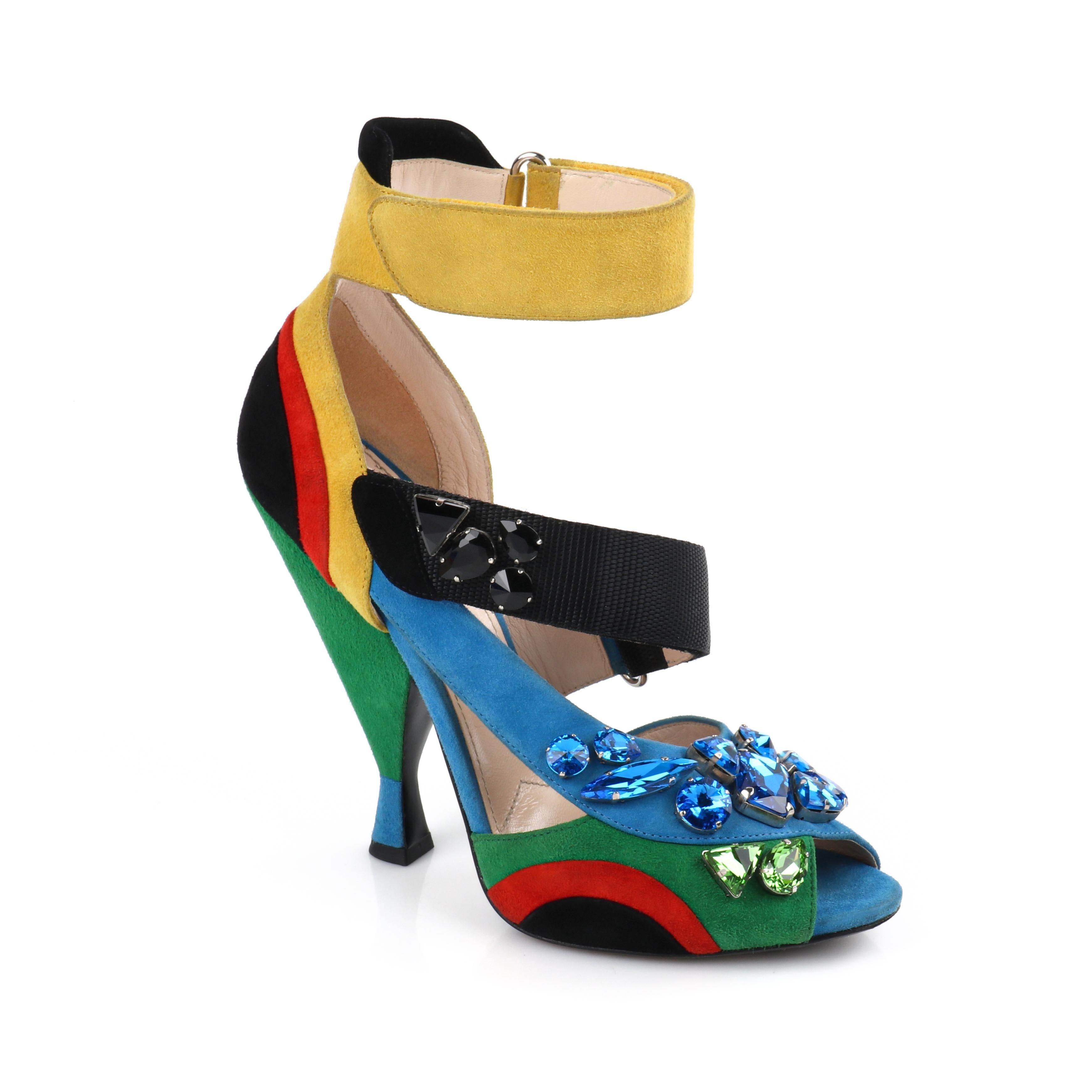PRADA Color Block Suede Modern Abstract Jeweled Strappy Peep Toe Sandal Pumps
  
Brand / Manufacturer: Prada
Designer: Miuccia Prada
Style: Heels
Marked Size: 39
Color(s): Shades of blue, green, yellow, red, black (exterior, detail); nude
