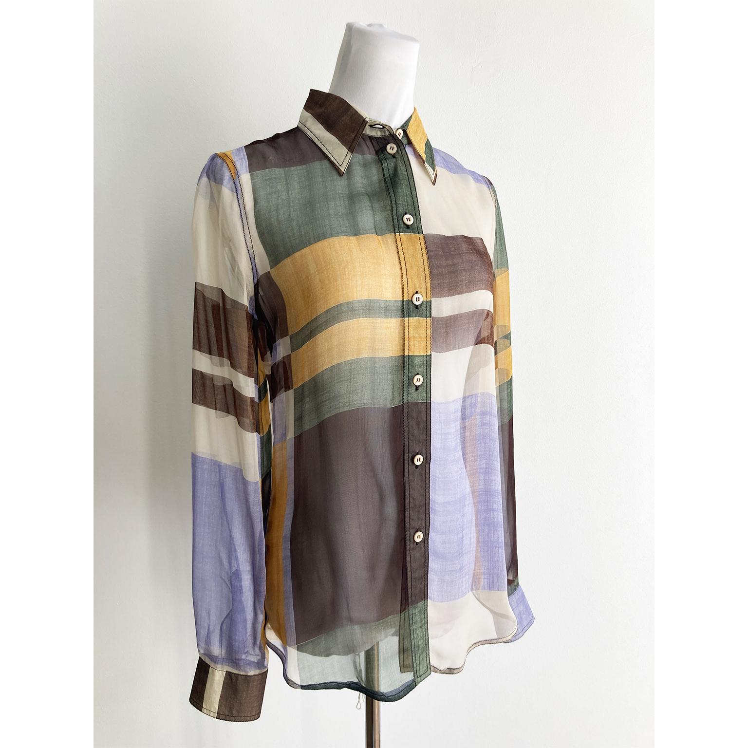 A vibrant piece from Prada's iconic AW 1996 collection, this silk shirt showcases a striking color block design. This color panel was a favorite of Miuccia Prada, appearing throughout the runway show. Famously worn by Kate Moss in the show, this