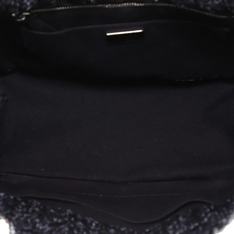 black prada raffia bag