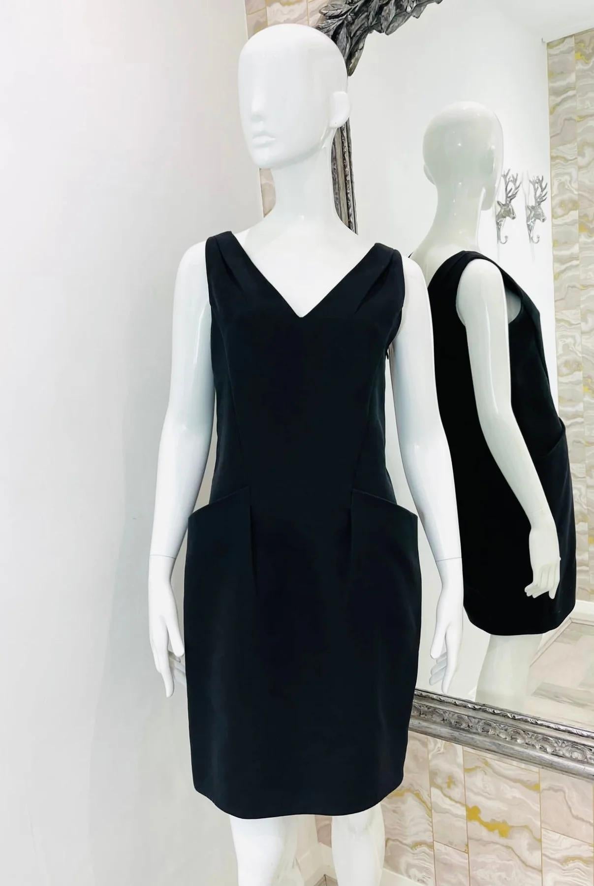 Prada Cotton Sleeveless Dress

Black pinafore style dress with hip pockets.

Additional information:
Size – 40IT
Composition – Cotton
Condition – Very Good