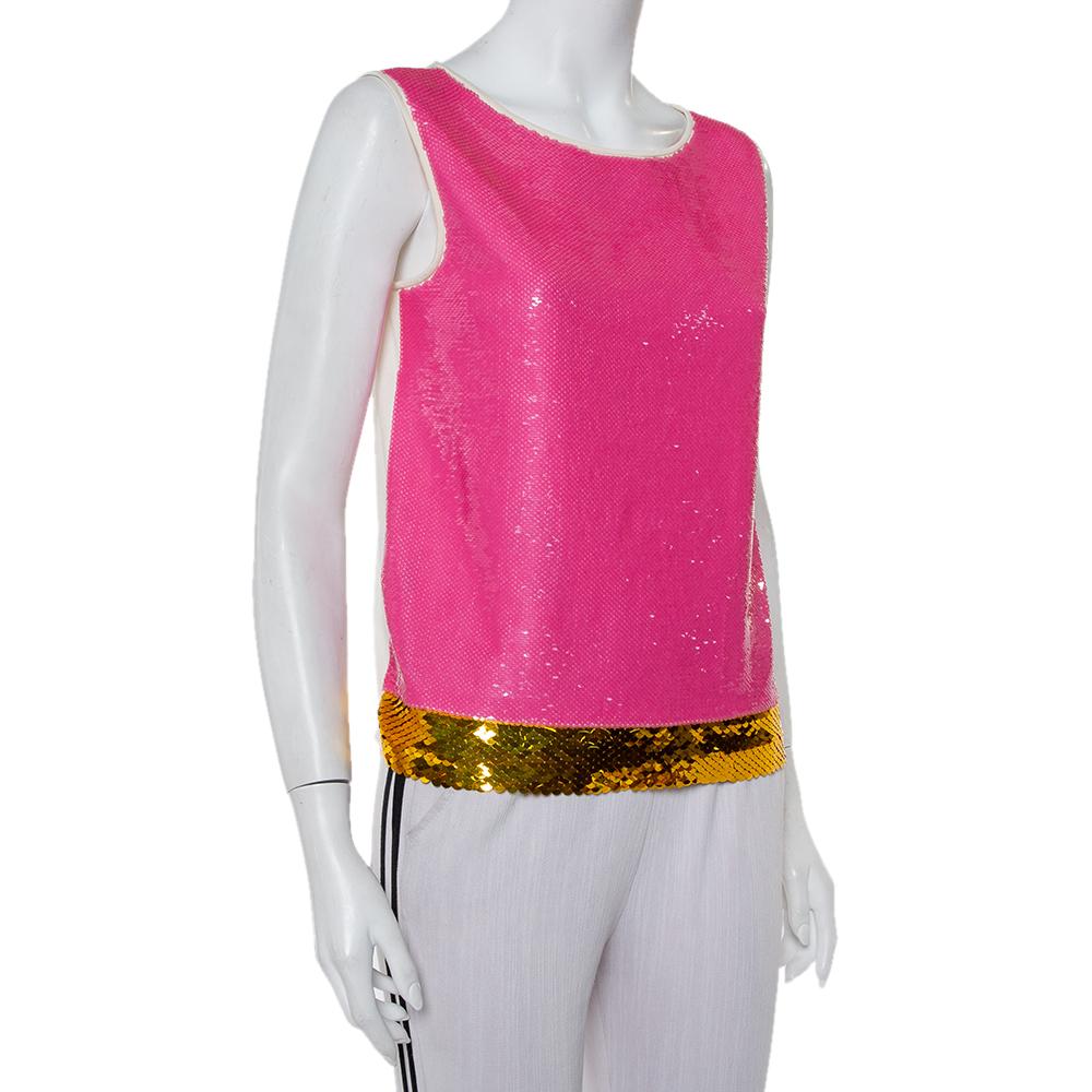 How fabulous does this Prada top look! The cream sleeveless creation is made of a cotton and silk blend and features a flattering silhouette. It has been embellished with sequins all over on the front and styled with a round neckline. Pair it with