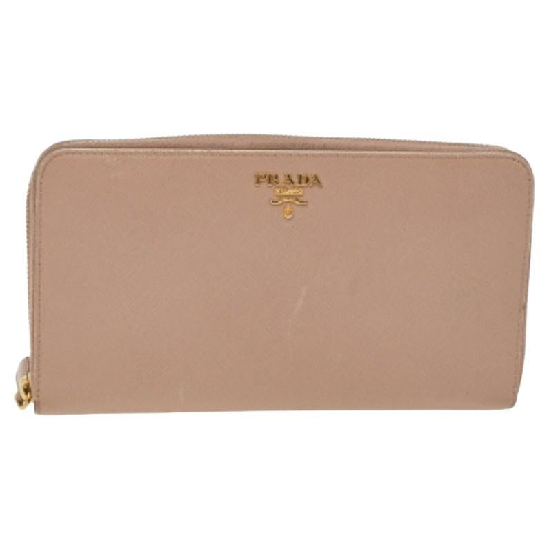 Portafoglio con zip in pelle saffiano crema di Prada