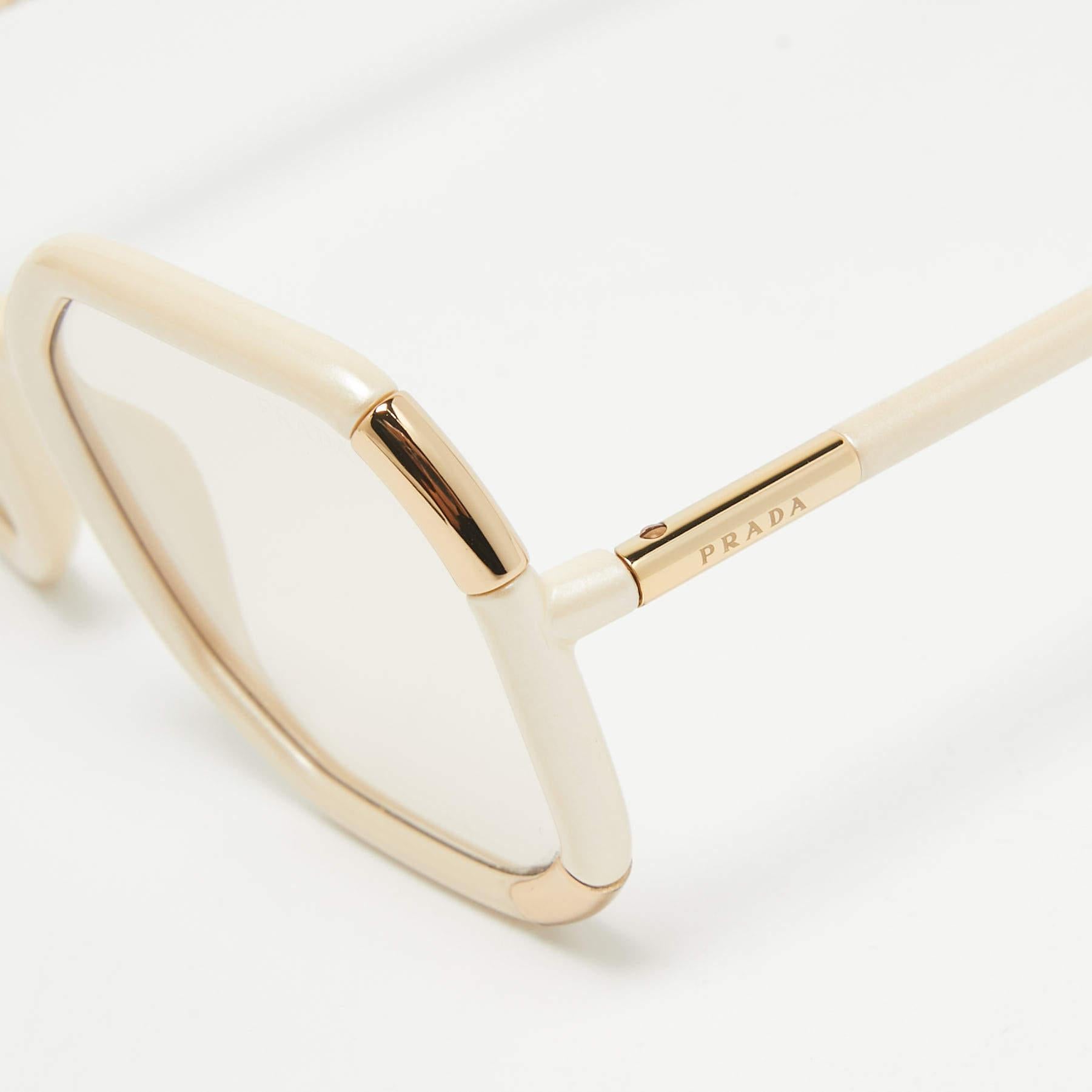 The stylish frame and good quality lenses make these sunglasses a high fashion accessory that you must own. Designed by Prada  the pair will look best with your statement outfits.