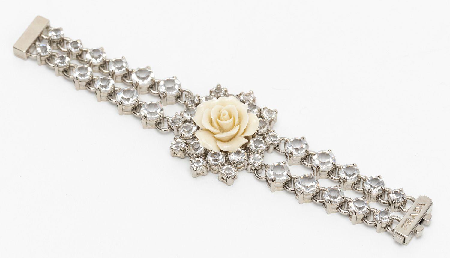 Cream rose & Swarovski crystal bracelet. SILVER CLASP. From the Prada Resort 2012 campaign. Excellent condition. Size small.
Prada Cream Rose & Swarovski Crystal Bracelet-Resort Collection 2012