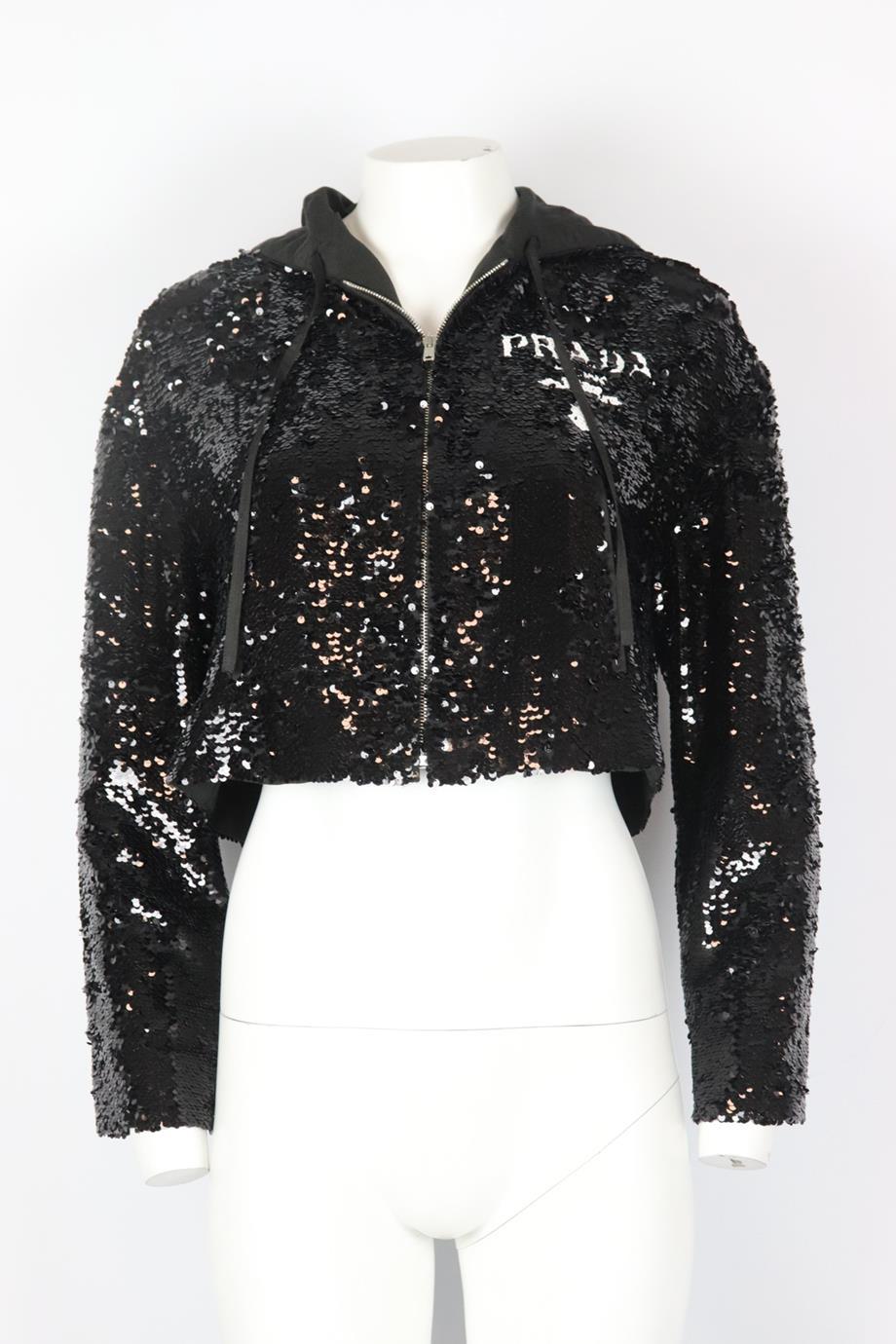 Prada cropped logo detailed sequined chiffon hoodie. Black and white. Long sleeve, crewneck. Zip fastening at front. 100% Silk; lining: 66% viscose, 34% silk. Size: IT 36 (UK 4, US 0, FR 32). Bust: 36 in. Waist: 39 in. Length: 17 in. Very good