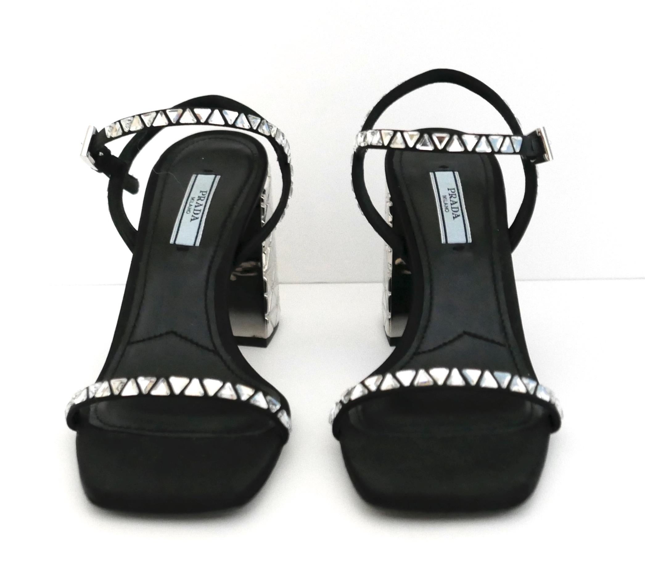 Stunning, sold out Prada crystal sandals - bought for £1200 and new with box and dustbags. Have black leather, triangle crystal studded straps and chunky disco ball inspired moulded chunky heels. Size 36/Uk3. Measure approx 9” heel to toe and heel